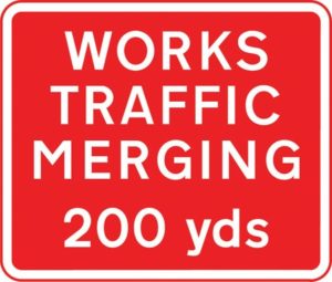 works traffic merging sign